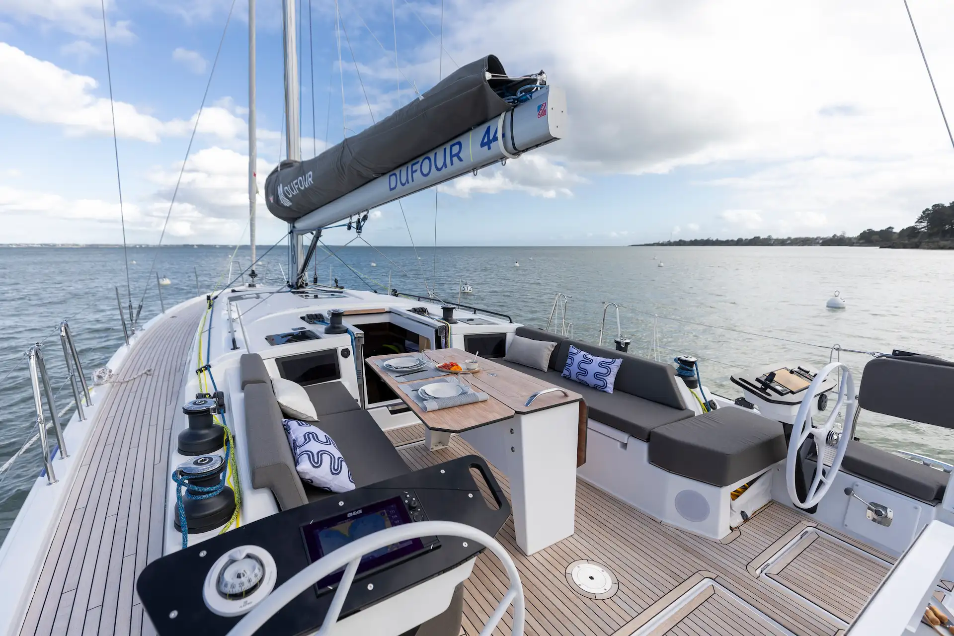 Dufour 44 Hybrid sailing yacht cockpit with Joool electric system, outdoor living area