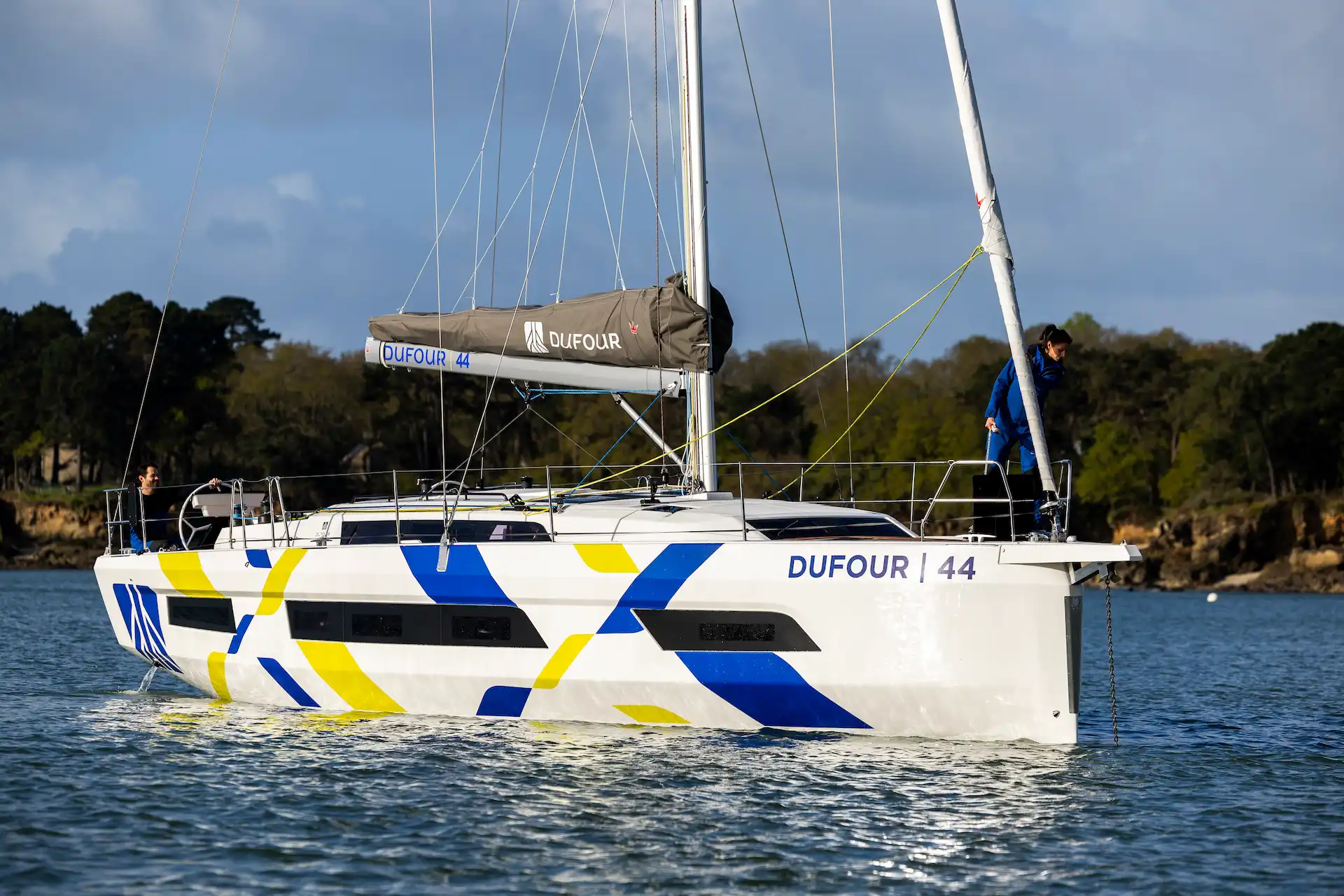 Dufour 44 Hybrid sailing yacht with Joool electric system, exterior profile at anchor