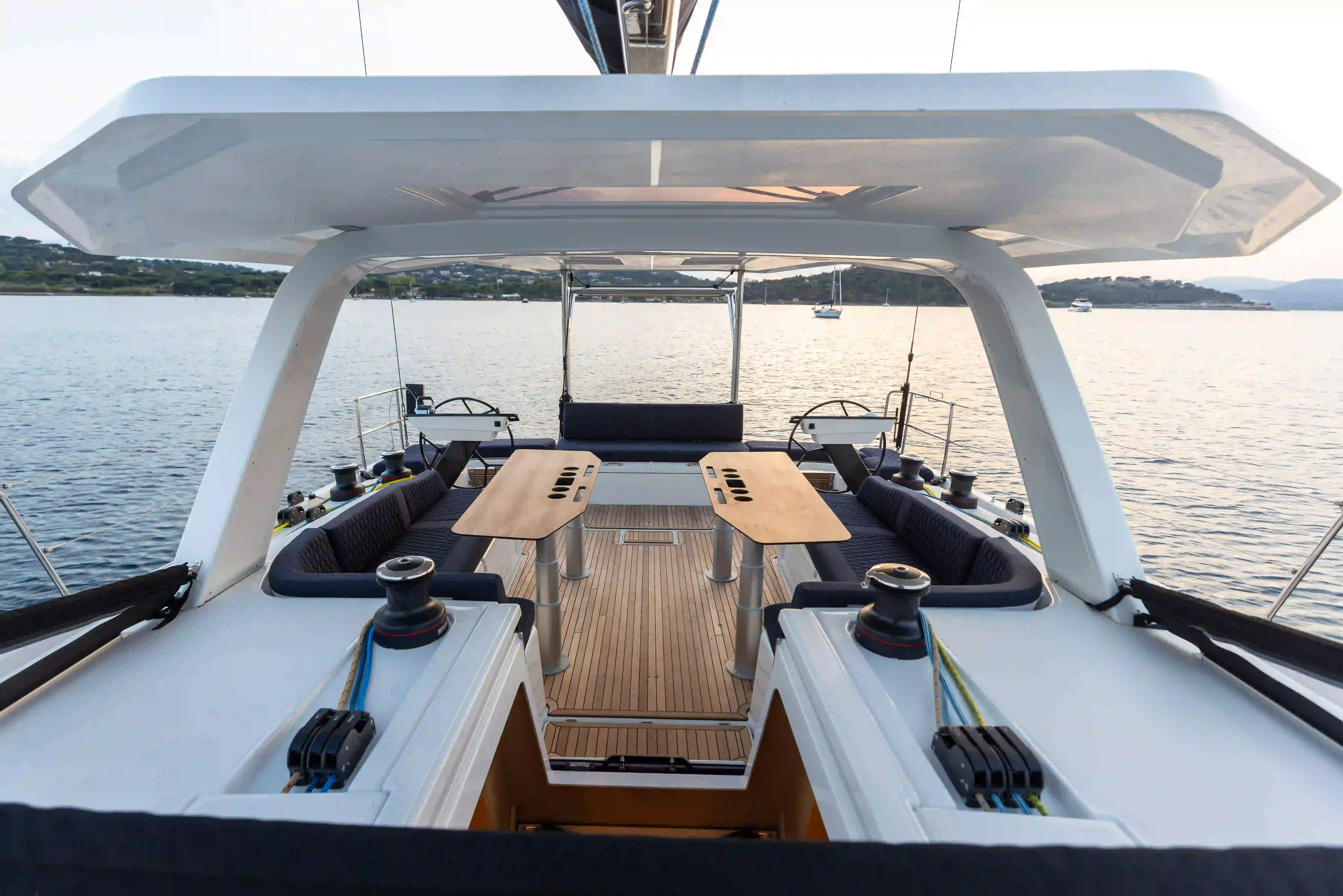 Hybrid Dufour 54 cockpit designed for relaxed living at anchor, offering shaded seating, smooth circulation, and a calm onboard atmosphere joool